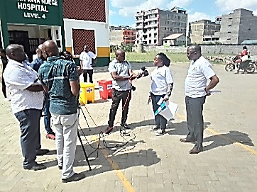 Press interview during waste bin handover at Tassia Kwa Ndege Hospital