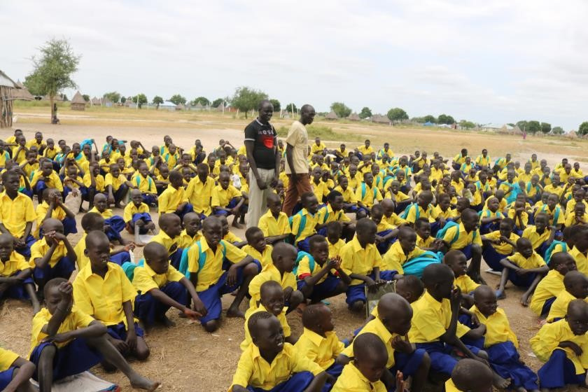 Yuai Primary School students after receiving uniforms, Urol, South Sudan